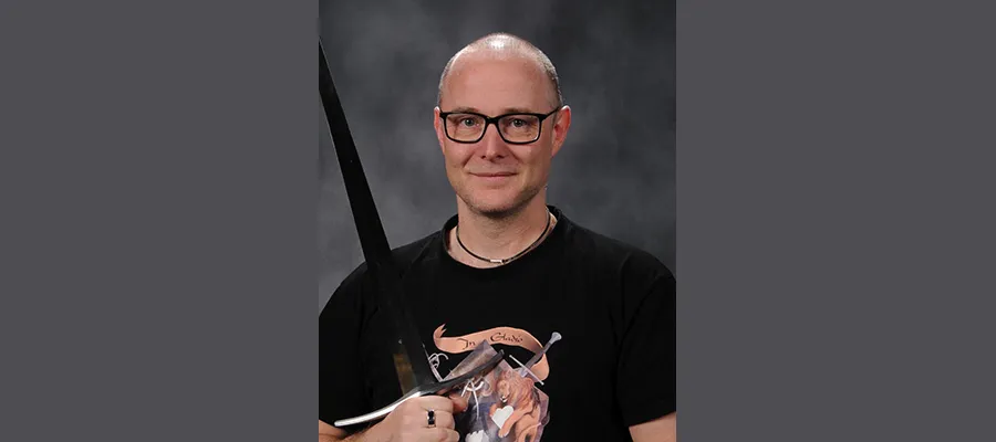 Guy Windsor holding a sword