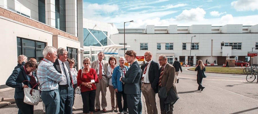 Class of 1966 on a tour of the Little France campus