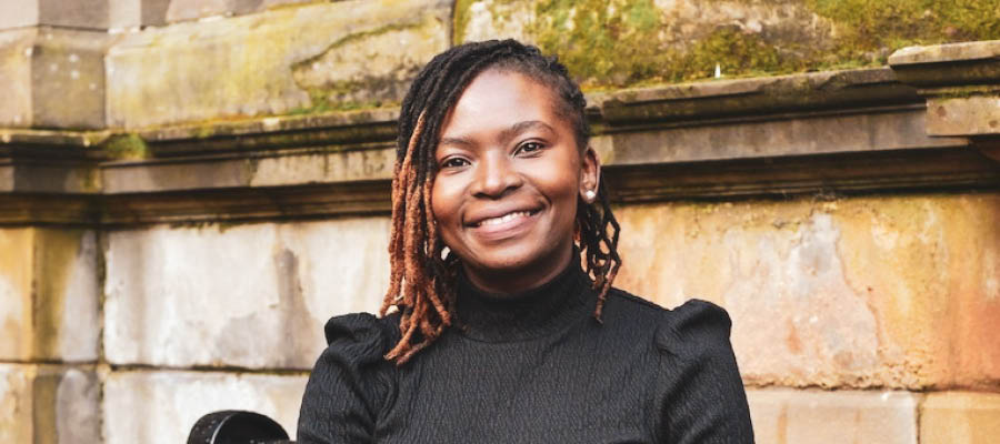 Portrait of Gloria Omuya in Old College Quad.