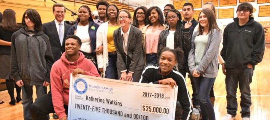 Katherine surrounded by her students and colleagues