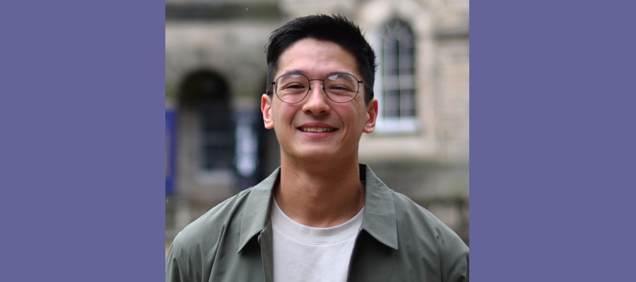 Ben Tan smiling and facing into camera.