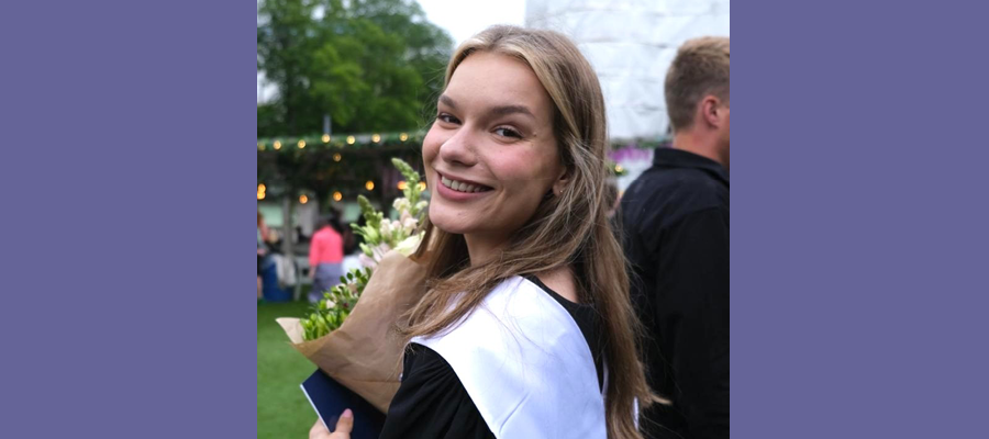 Brigid Golden in her graduation gown.